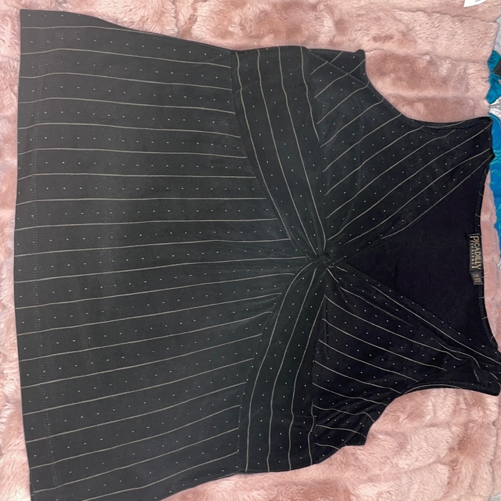 Black colored sleeveless top